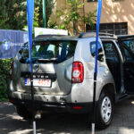 Delegacja Ukrainy odbierająca auto od powiatu poznańskiego