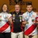Julia Babica i Wiktor Kaczmarek z medalami. W środku Radosław Babica, szef Akademii